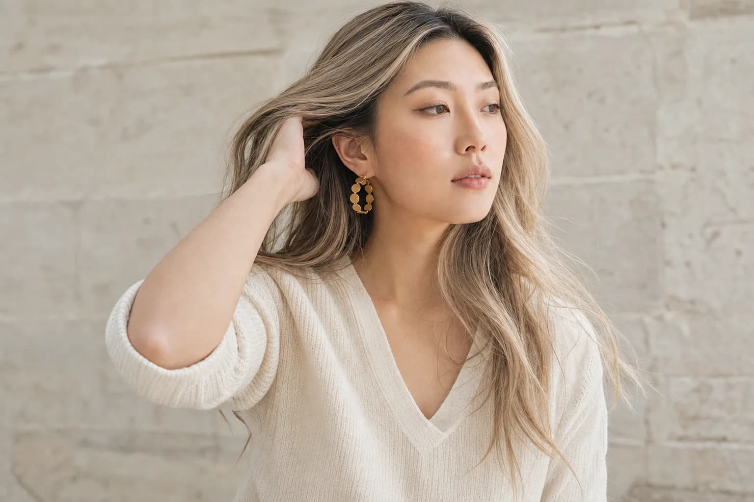 Orbit Hoops half hidden by loose hair, outdoors in daylight